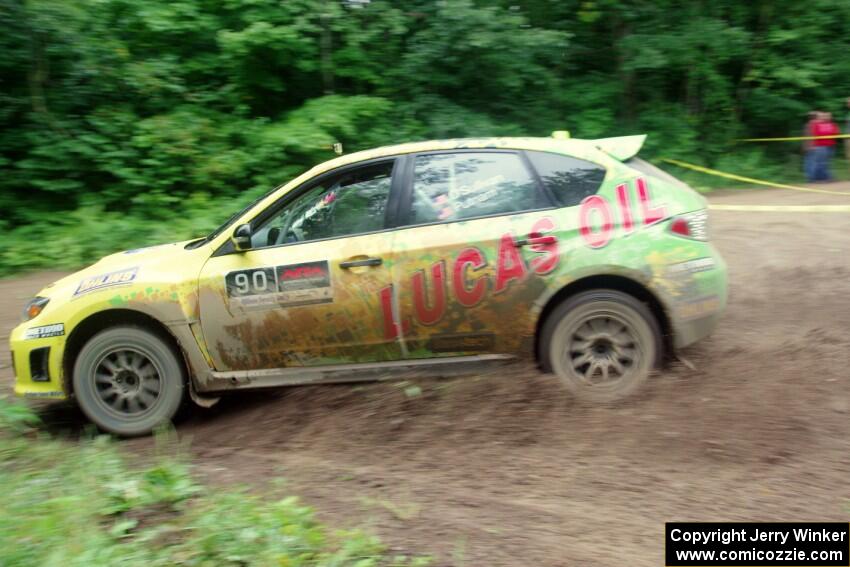 Lauchlin O'Sullivan / Scott Putnam Subaru WRX STi comes through the VIP spectator corner on SS8, Perkins Road.