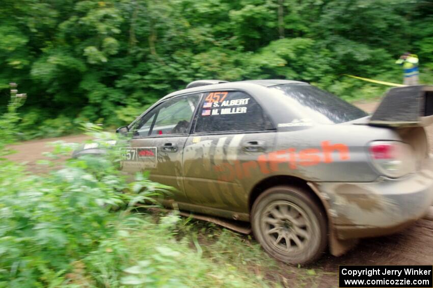 Sam Albert / Michelle Miller Subaru WRX STi comes through the VIP spectator corner on SS8, Perkins Road.