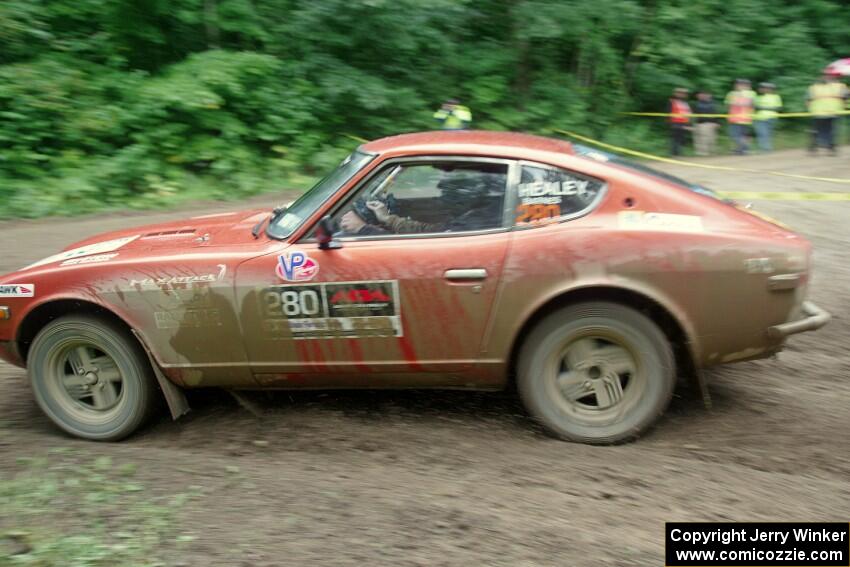 Greg Healey / Phil Barnes Datsun 280Z comes through the VIP spectator corner on SS8, Perkins Road.