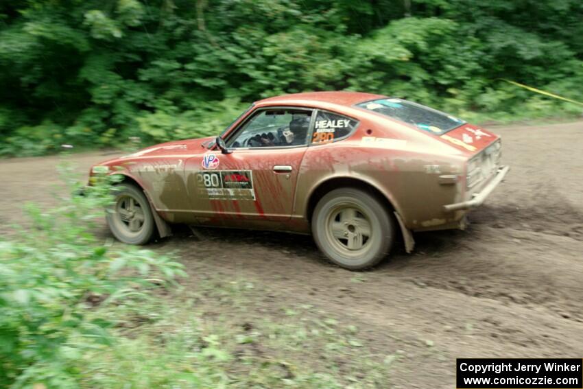 Greg Healey / Phil Barnes Datsun 280Z comes through the VIP spectator corner on SS8, Perkins Road.