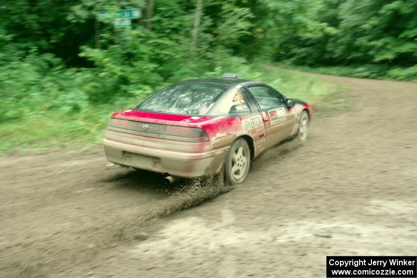 Tret West / Brandon Reinhardt Eagle Talon comes through the VIP spectator corner on SS8, Perkins Road.