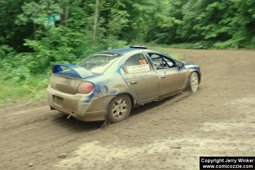 Don Coatsworth / Cody Coatsworth Dodge SRT-4 comes through the VIP spectator corner on SS8, Perkins Road.