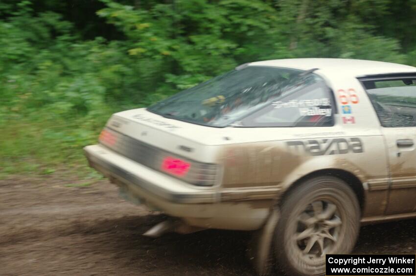 Mike Halley / Jimmy Brandt Mazda RX7 GSL-SE comes through the VIP spectator corner on SS8, Perkins Road.