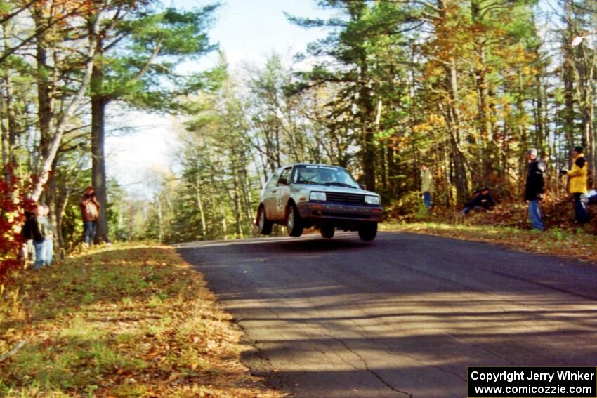 Chris Whiteman / Mike Paulin VW GTI at the midpoint jump on SS16, Brockway Mt.