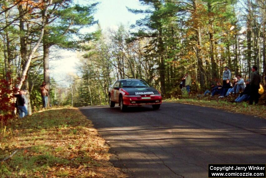 Scott Harvey, Jr. / Jeff Hribar Eagle Talon TSi at the midpoint jump on SS16, Brockway Mt.