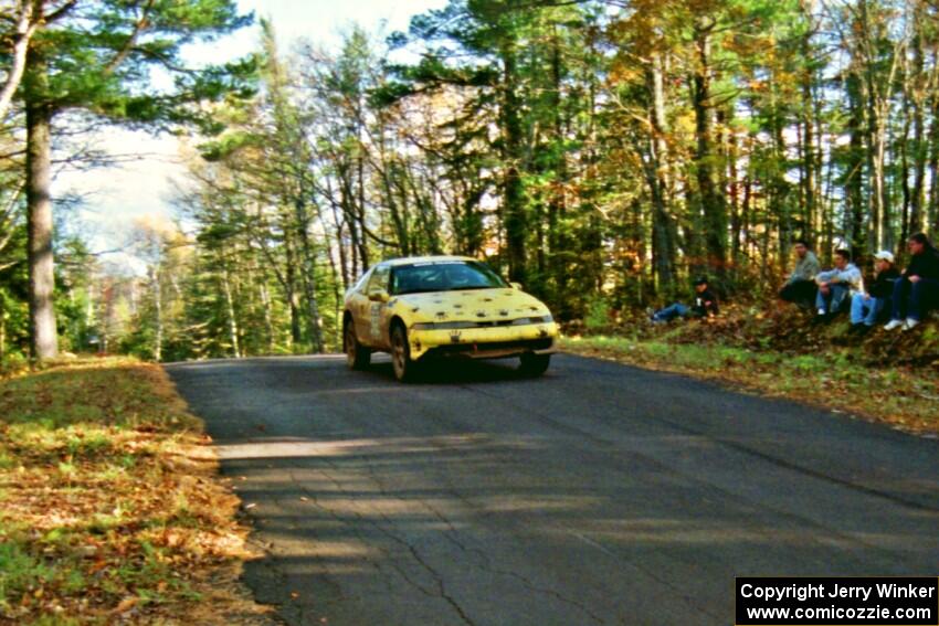 Rod Dean / Nichole Dean Plymouth Laser RS at the midpoint jump on SS16, Brockway Mt.