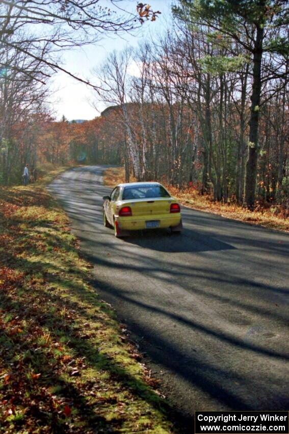 Dave Johnson / Shannon Johnson Dodge Neon ACR at speed on SS16, Brockway Mt.