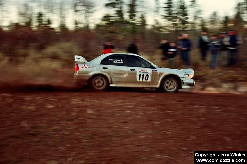 Mark Nelson / Alex Gelsomino Mitsubishi Lancer Evo VI comes through the spectator corner on SS19, Gratiot Lake II.