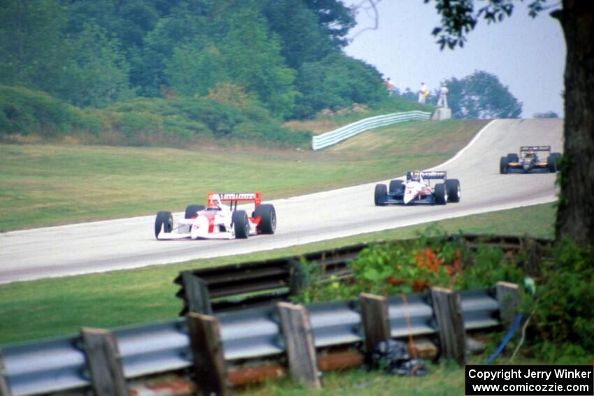 Emerson Fittipaldi's Penske PC-21/Chevy, Al Unser, Jr.'s Galmer G92/Chevy and Bobby Rahal's Lola T-92/00/Chevy