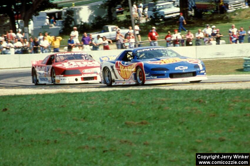 Jack Baldwin's Chevy Camaro and Walter Payton's Ford Mustang