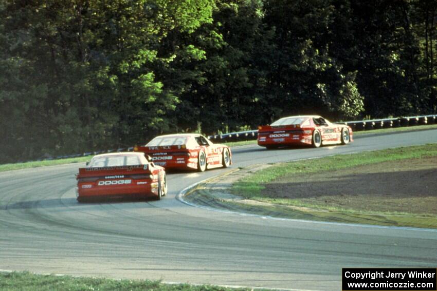 Tommy Archer leads Bobby Archer and Mitch Wright, all in Dodge Daytonas.