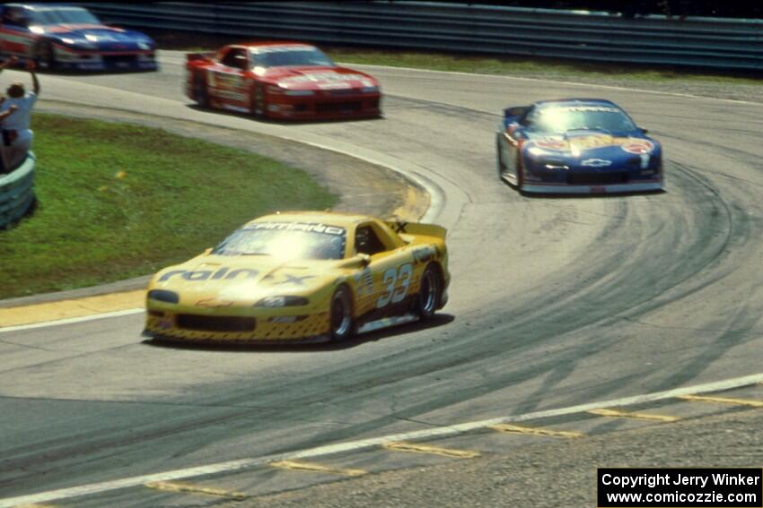 Scott Sharp's Chevy Camaro, Jack Baldwin's Chevy Camaro, Mitch Wright's Dodge Daytona and Greg Pickett's Chevy Camaro