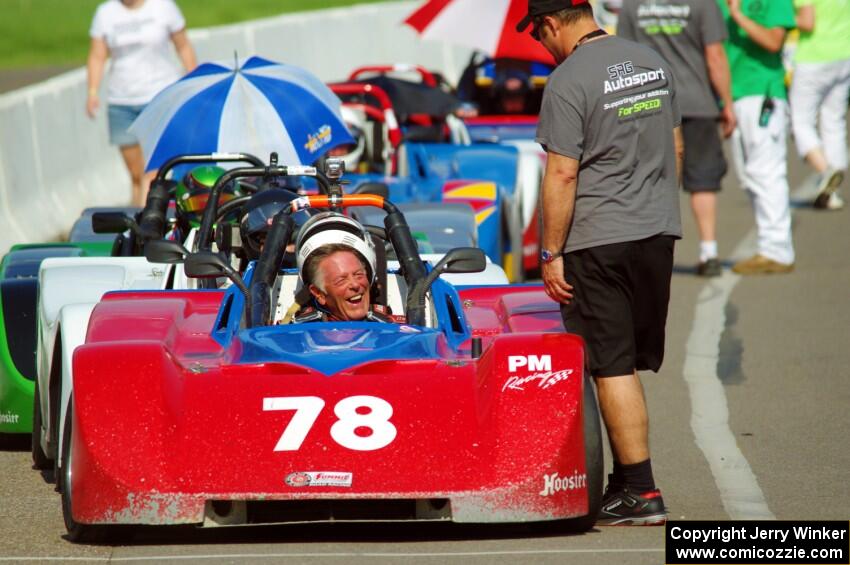 Reid Johnson's Spec Racer Ford 3 on the false grid.