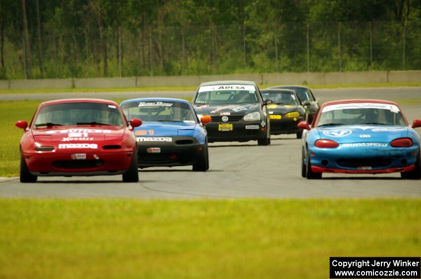 Rick Buan's, Andrew Jenkins' and Gordon Kuhnley's Spec Miata Mazda Miatas