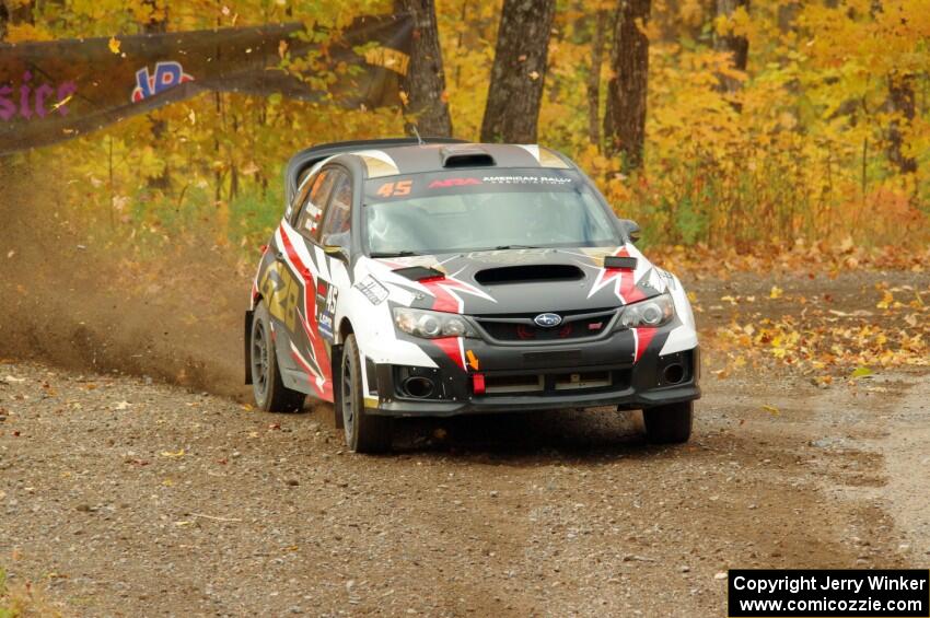 Grzegorz Bugaj / Ela Dziubanski Subaru WRX STi comes through the spectator point on SS9, Arvon-Silver I.