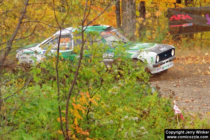 Seamus Burke / Martin Brady Ford Escort Mk. II slides to a stop at the spectator point on SS9, Arvon-Silver I.