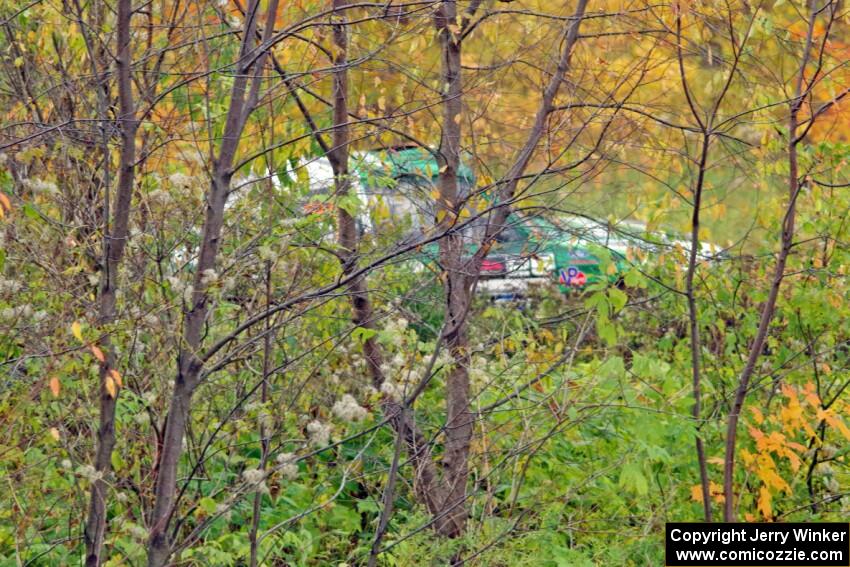 Seamus Burke / Martin Brady Ford Escort Mk. II slides to a stop at the spectator point on SS9, Arvon-Silver I.