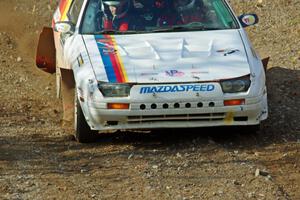 Kevin Schmidt / Jay Anderson Maxda RX-7 comes through the spectator point on SS9, Arvon-Silver I.