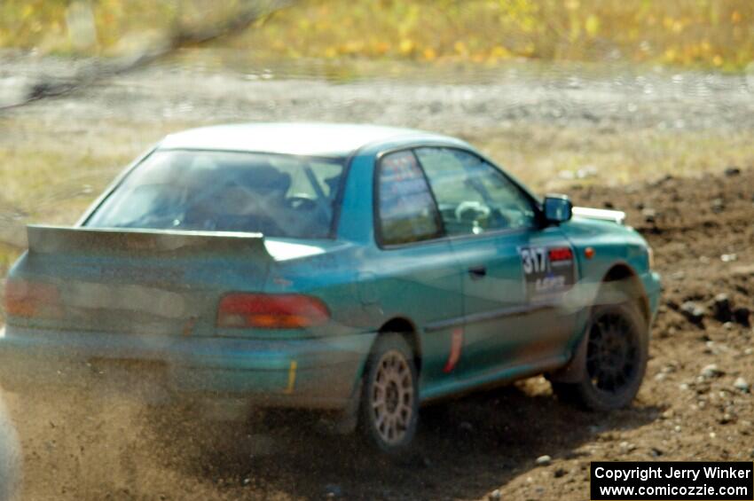 Kyle Turner / Kevin Turner Subaru Impreza comes through the spectator point on SS9, Arvon-Silver I.