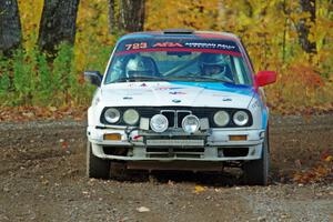 Calvin Cooper / Kelsey Stephens BMW 318is comes through the spectator point on SS9, Arvon-Silver I.