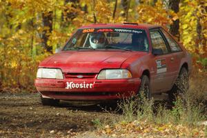 Andrew Mozer / Eric Mozer Ford Mustang comes through the spectator point on SS9, Arvon-Silver I.