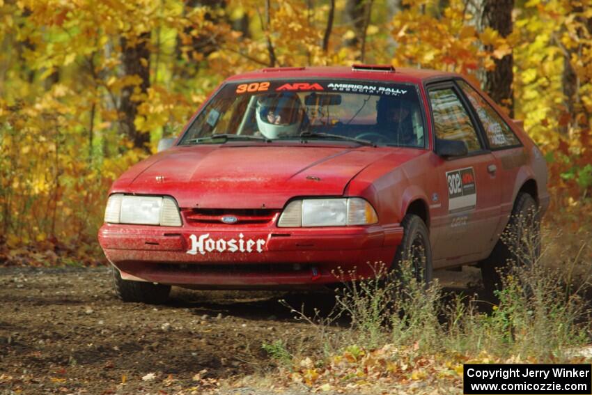 Andrew Mozer / Eric Mozer Ford Mustang comes through the spectator point on SS9, Arvon-Silver I.