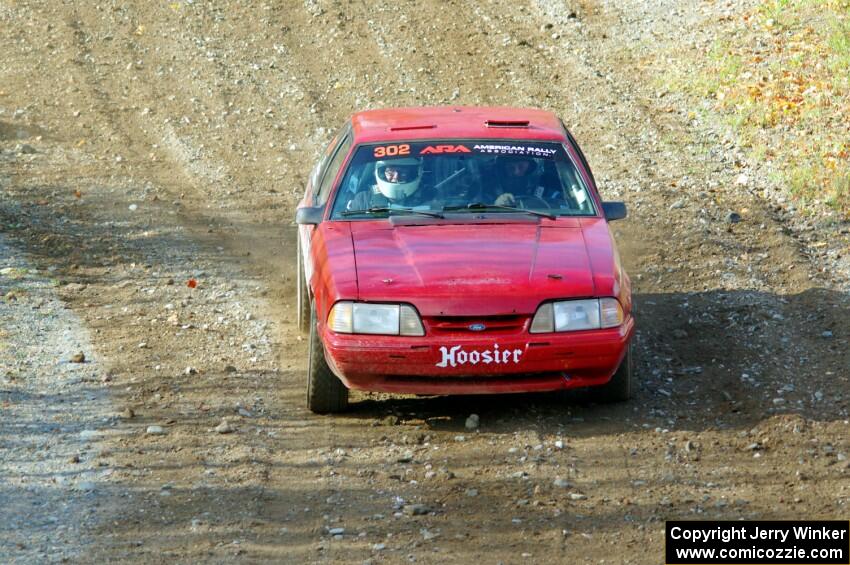 Andrew Mozer / Eric Mozer Ford Mustang comes through the spectator point on SS9, Arvon-Silver I.