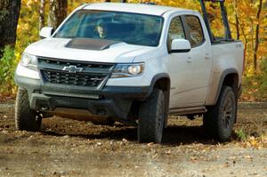 A Chevy Colorado ZR2 Pickup sweep vehicle comes through the spectator location on SS9, Arvon-Silver I.