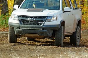 A Chevy Colorado ZR2 Pickup sweep vehicle comes through the spectator location on SS9, Arvon-Silver I.