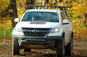 A Chevy Colorado ZR2 Pickup sweep vehicle comes through the spectator location on SS9, Arvon-Silver I.