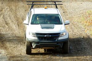 A Chevy Colorado ZR2 Pickup sweep vehicle comes through the spectator location on SS9, Arvon-Silver I.