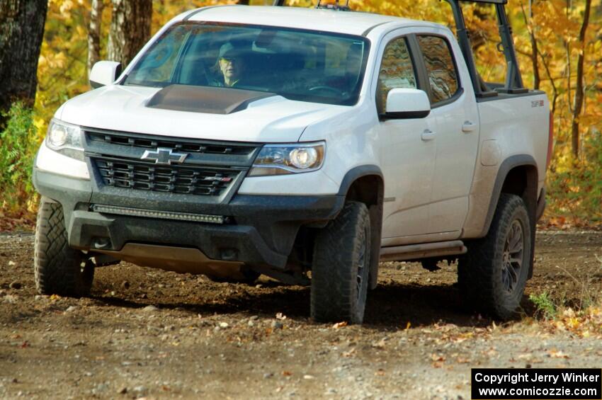 A Chevy Colorado ZR2 Pickup sweep vehicle comes through the spectator location on SS9, Arvon-Silver I.