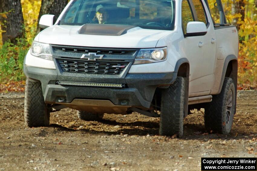 A Chevy Colorado ZR2 Pickup sweep vehicle comes through the spectator location on SS9, Arvon-Silver I.