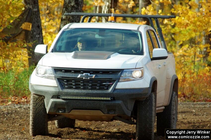 A Chevy Colorado ZR2 Pickup sweep vehicle comes through the spectator location on SS9, Arvon-Silver I.