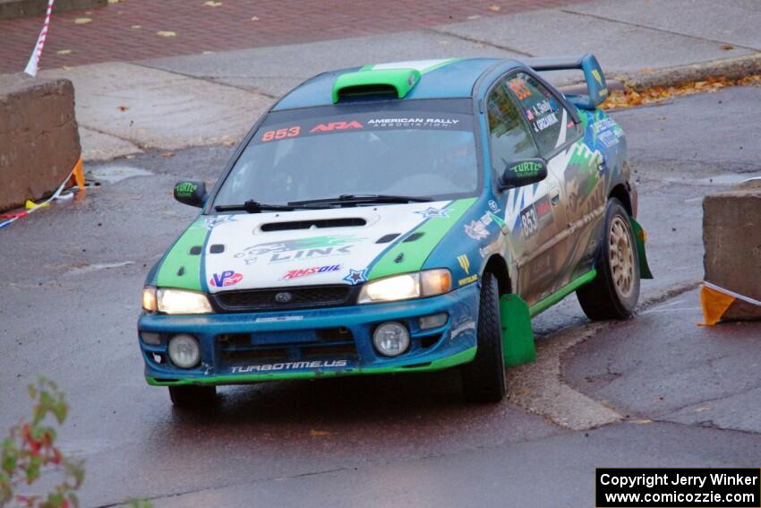 Amanda Skelly / Jason Grizaniuk Subaru Impreza on SS15, Lakeshore Drive.