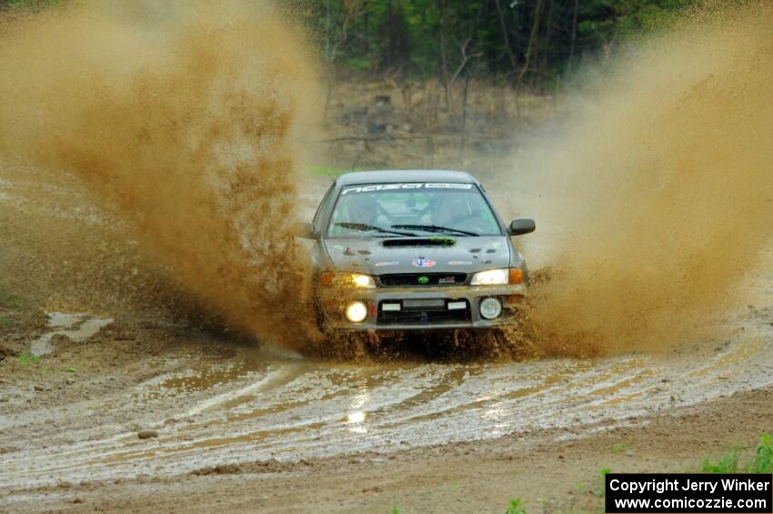 Jordan Locher / Tom Addison Subaru Impreza 2.5RS on SS1, J5 North I.