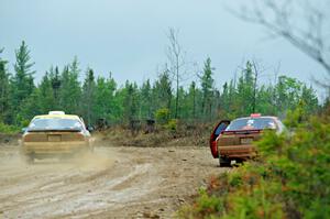 Kevin Schmidt / Kyle Roberts Mazda RX-7 passes by Al Dantes, Jr. / Brandon Snyder Mazda RX-7 LS on SS1, J5 North I.