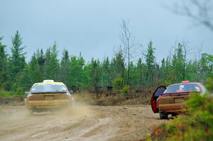 Kevin Schmidt / Kyle Roberts Mazda RX-7 passes by Al Dantes, Jr. / Brandon Snyder Mazda RX-7 LS on SS1, J5 North I.