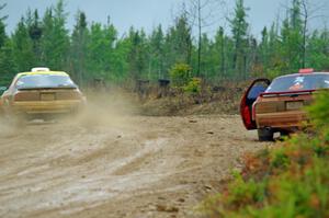 Kevin Schmidt / Kyle Roberts Mazda RX-7 passes by Al Dantes, Jr. / Brandon Snyder Mazda RX-7 LS on SS1, J5 North I.