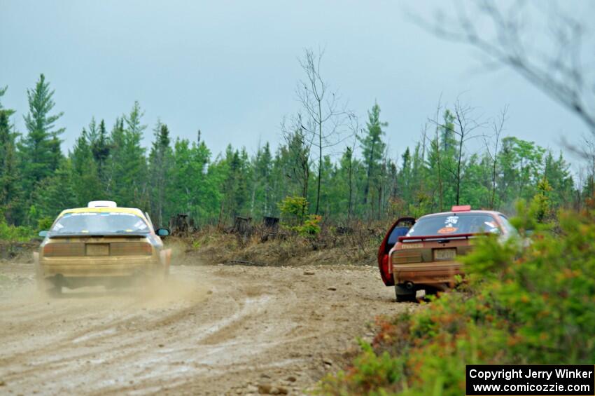 Kevin Schmidt / Kyle Roberts Mazda RX-7 passes by Al Dantes, Jr. / Brandon Snyder Mazda RX-7 LS on SS1, J5 North I.