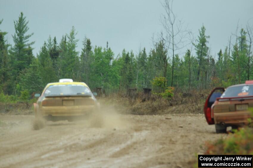 Kevin Schmidt / Kyle Roberts Mazda RX-7 passes by Al Dantes, Jr. / Brandon Snyder Mazda RX-7 LS on SS1, J5 North I.