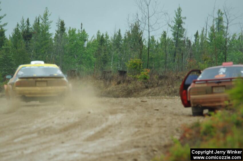 Kevin Schmidt / Kyle Roberts Mazda RX-7 passes by Al Dantes, Jr. / Brandon Snyder Mazda RX-7 LS on SS1, J5 North I.