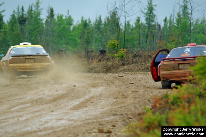 Kevin Schmidt / Kyle Roberts Mazda RX-7 passes by Al Dantes, Jr. / Brandon Snyder Mazda RX-7 LS on SS1, J5 North I.