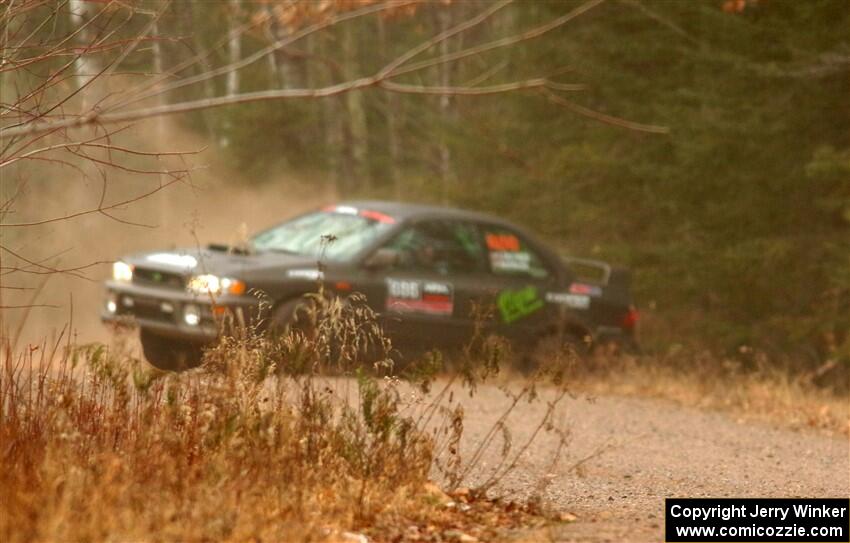 Jordan Locher / Tom Addison Subaru Impreza 2.5RS rolls on SS1.