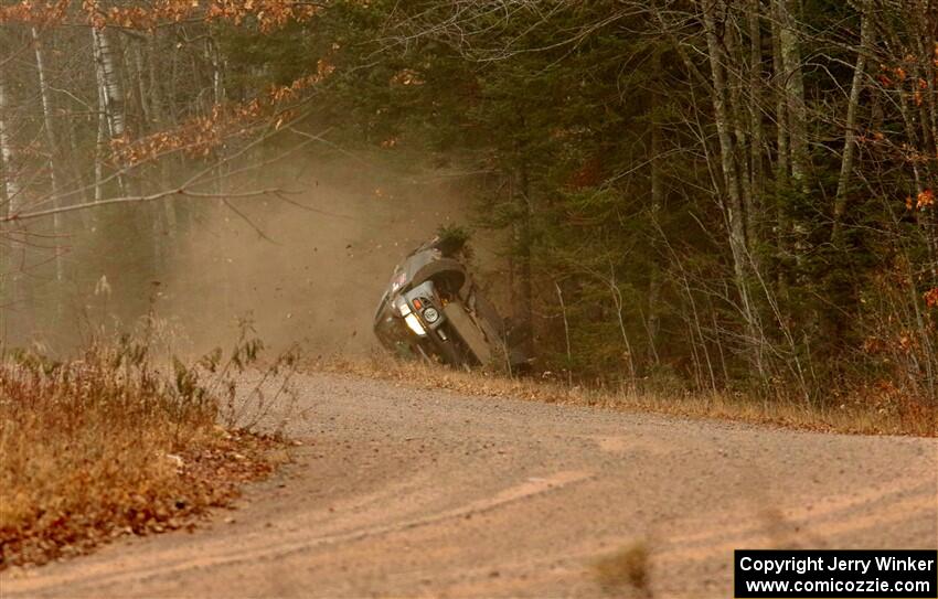 Jordan Locher / Tom Addison Subaru Impreza 2.5RS rolls on SS1.