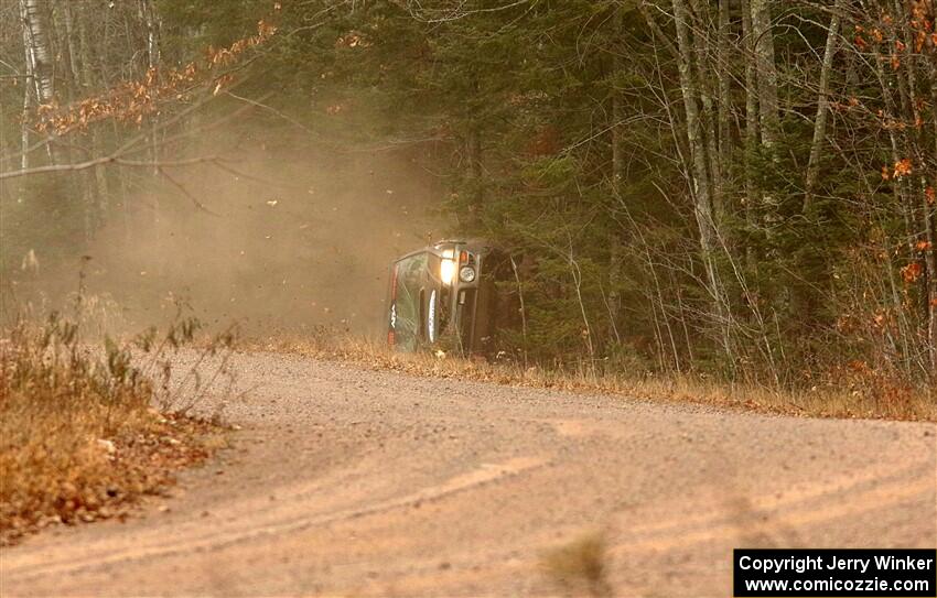 Jordan Locher / Tom Addison Subaru Impreza 2.5RS rolls on SS1.