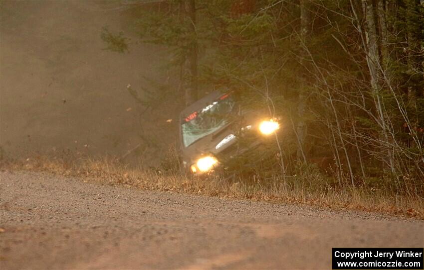 Jordan Locher / Tom Addison Subaru Impreza 2.5RS rolls on SS1.