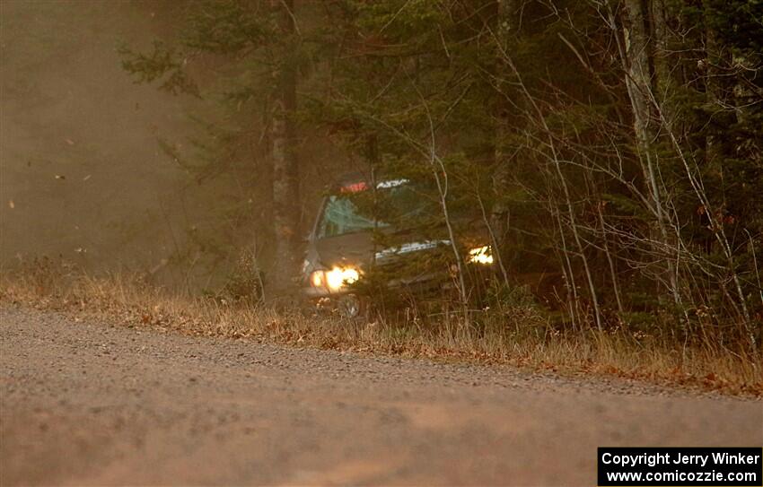 Jordan Locher / Tom Addison Subaru Impreza 2.5RS rolls on SS1.