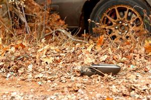 Scattered debris from the Jordan Locher / Tom Addison Subaru Impreza 2.5RS after rolling on SS1.