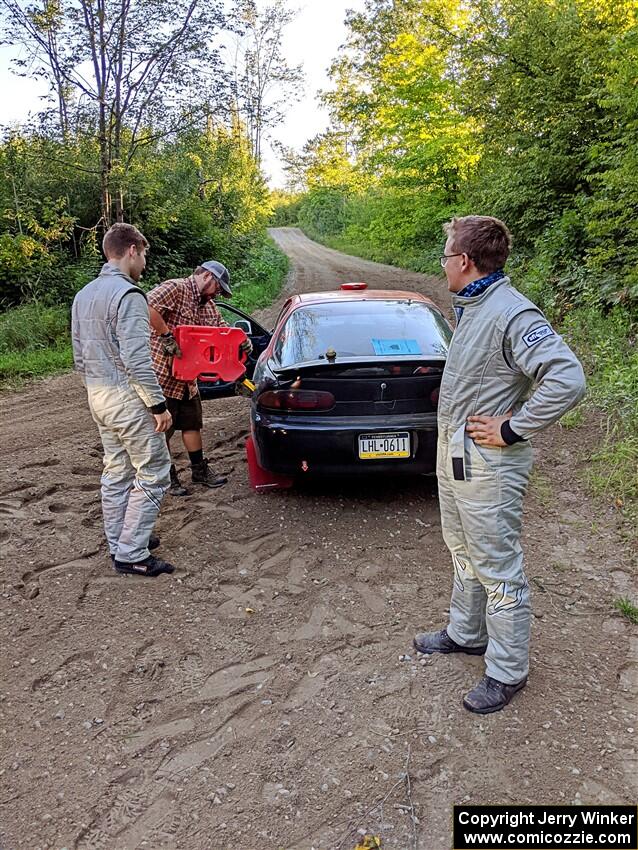 Josh Smith / Drake Hughes Mazda MX-3 refuels after running out on SS4, Crossroads II.